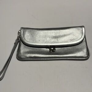 Talbots kiss lock clutch handbag
Silver